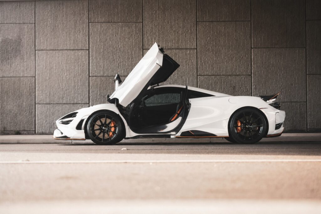 White McLaren exotic sports car available through luxury leasing program